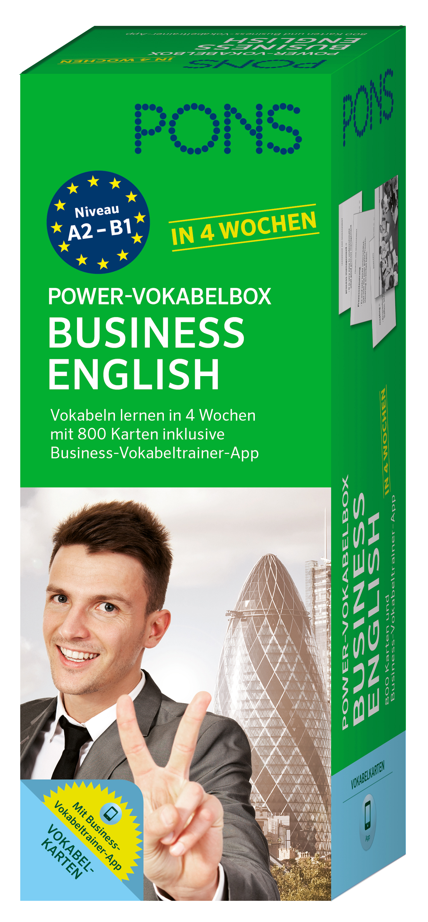 Eine Schachtel der PONS Power-Vokabelbox Business English, die einen lächelnden Mann im Anzug zeigt, der ein Friedenszeichen macht, mit Geschäftsgebäuden im Hintergrund. Der Text ist auf Deutsch.